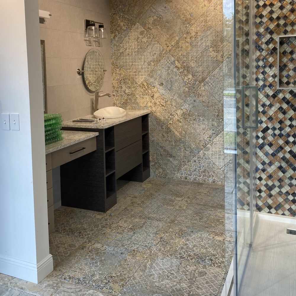 bathroom with a walk-in shower with glass doors