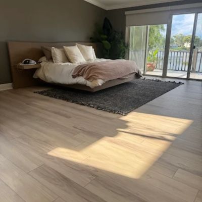 luxury vinyl floor remodel in a Florida bedroom Carr's Flooring America